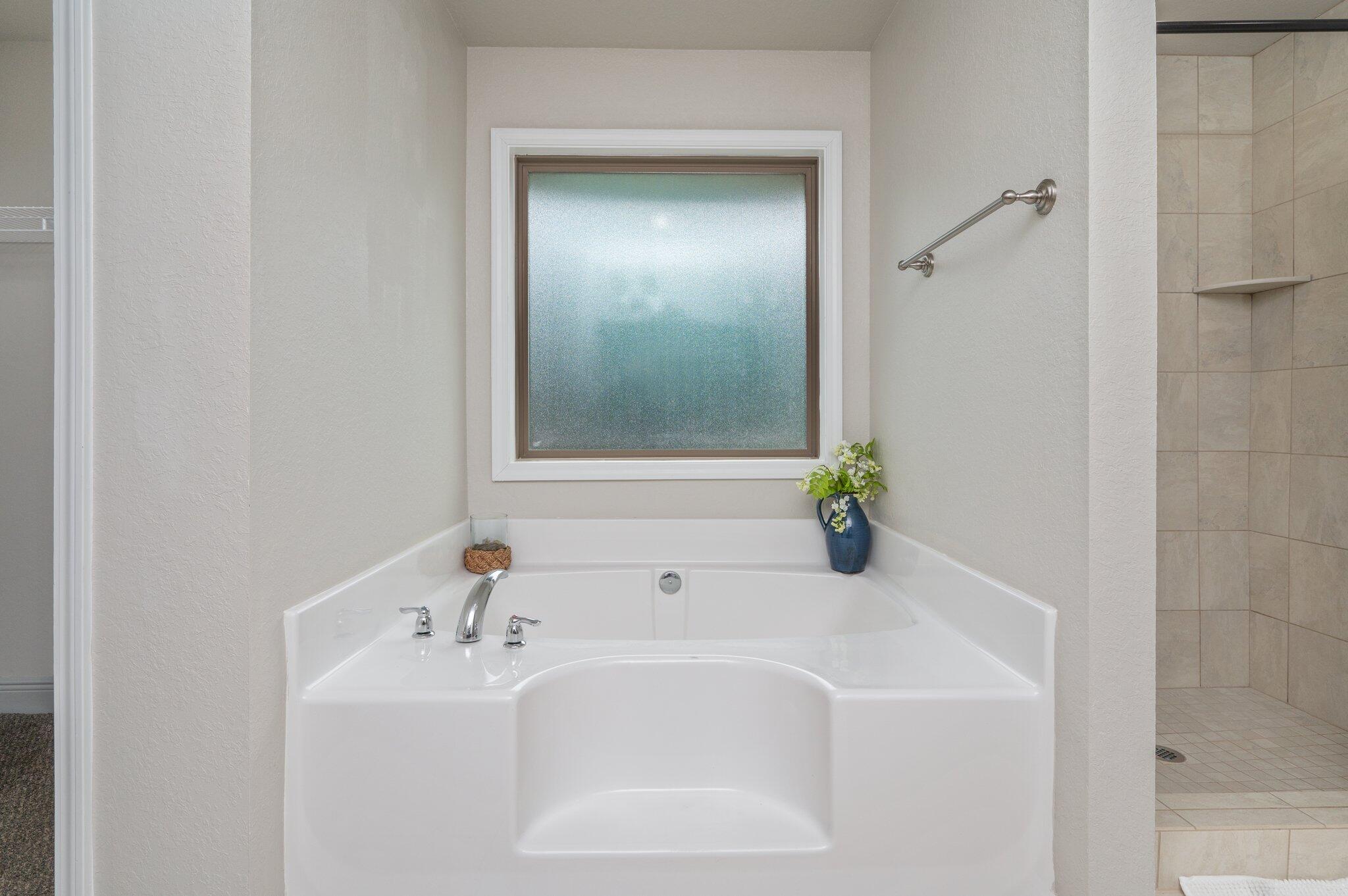605 Terrier Trail Crestview, FL 32536 - Photo 25 of 46 a bathroom with a sink and a mirror
