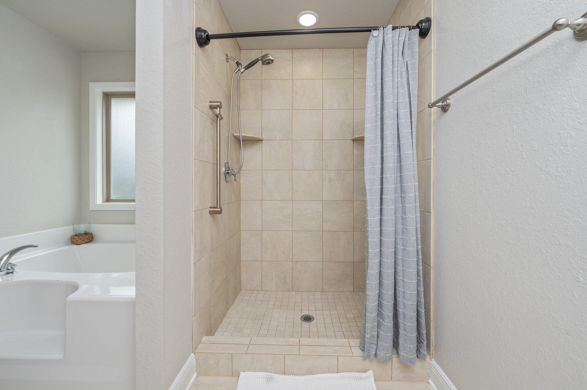 605 Terrier Trail Crestview, FL 32536 - Photo 26 of 46 a bathroom with a shower and a sink