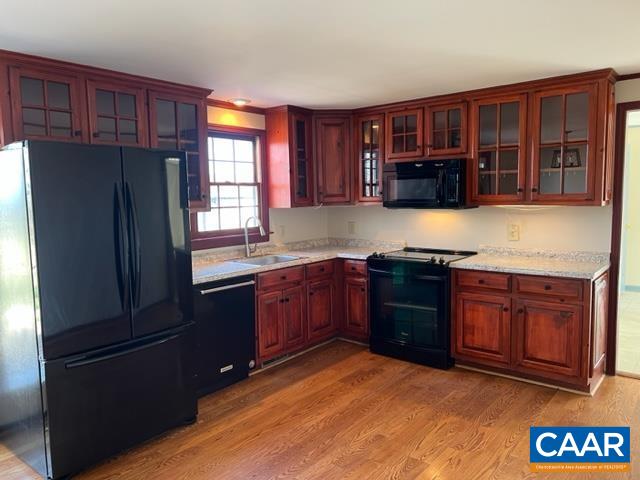 976 Douglas Church Road Farmville, VA 23901 - Photo 12 of 37 a kitchen with stainless steel appliances granite countertop a refrigerator and a sink