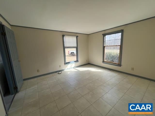 976 Douglas Church Road Farmville, VA 23901 - Photo 15 of 37 an empty room with windows and closet