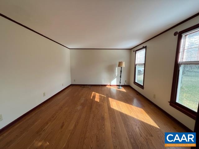 976 Douglas Church Road Farmville, VA 23901 - Photo 17 of 37 a view of empty room with wooden floor and fan