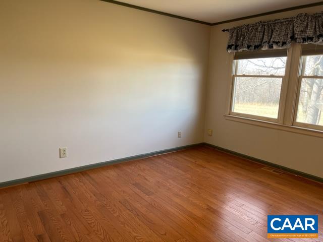 976 Douglas Church Road Farmville, VA 23901 - Photo 19 of 37 an empty room with a window