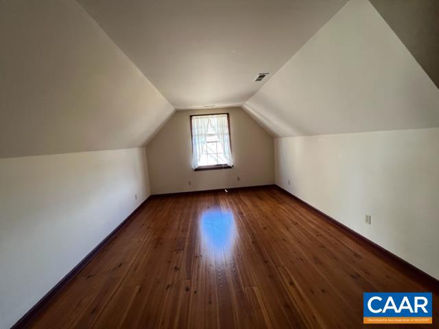 976 Douglas Church Road Farmville, VA 23901 - Photo 20 of 37 an empty room with wooden floor and windows