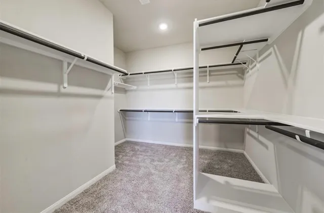 a view of a room with racks on the wall