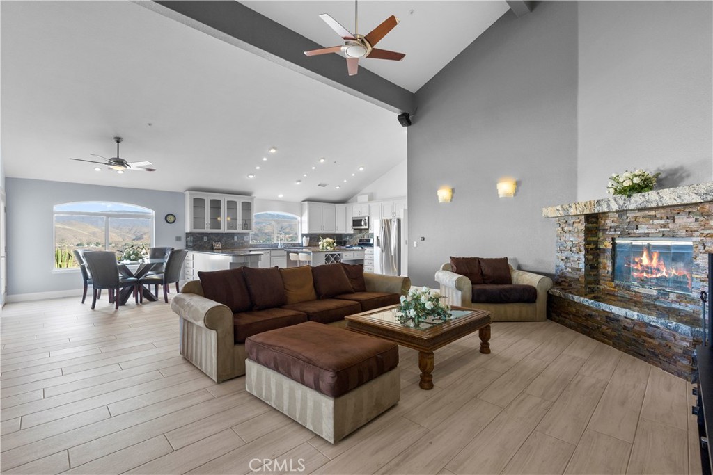 31800 Diamond View Lane Agua Dulce, CA 91390 - Photo 26 of 36 a living room with furniture and a fireplace