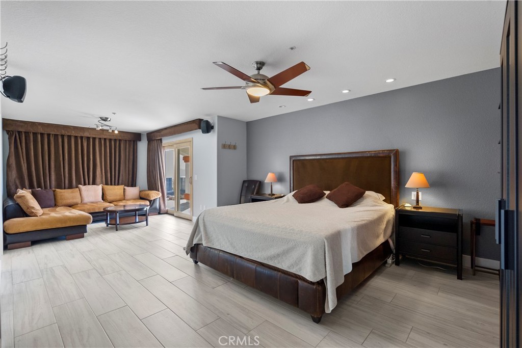 31800 Diamond View Lane Agua Dulce, CA 91390 - Photo 31 of 36 a bedroom with a bed couch and a window