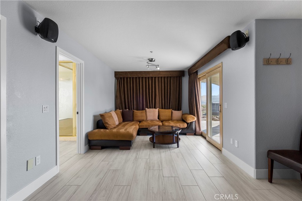 31800 Diamond View Lane Agua Dulce, CA 91390 - Photo 32 of 36 a living room with furniture and a window