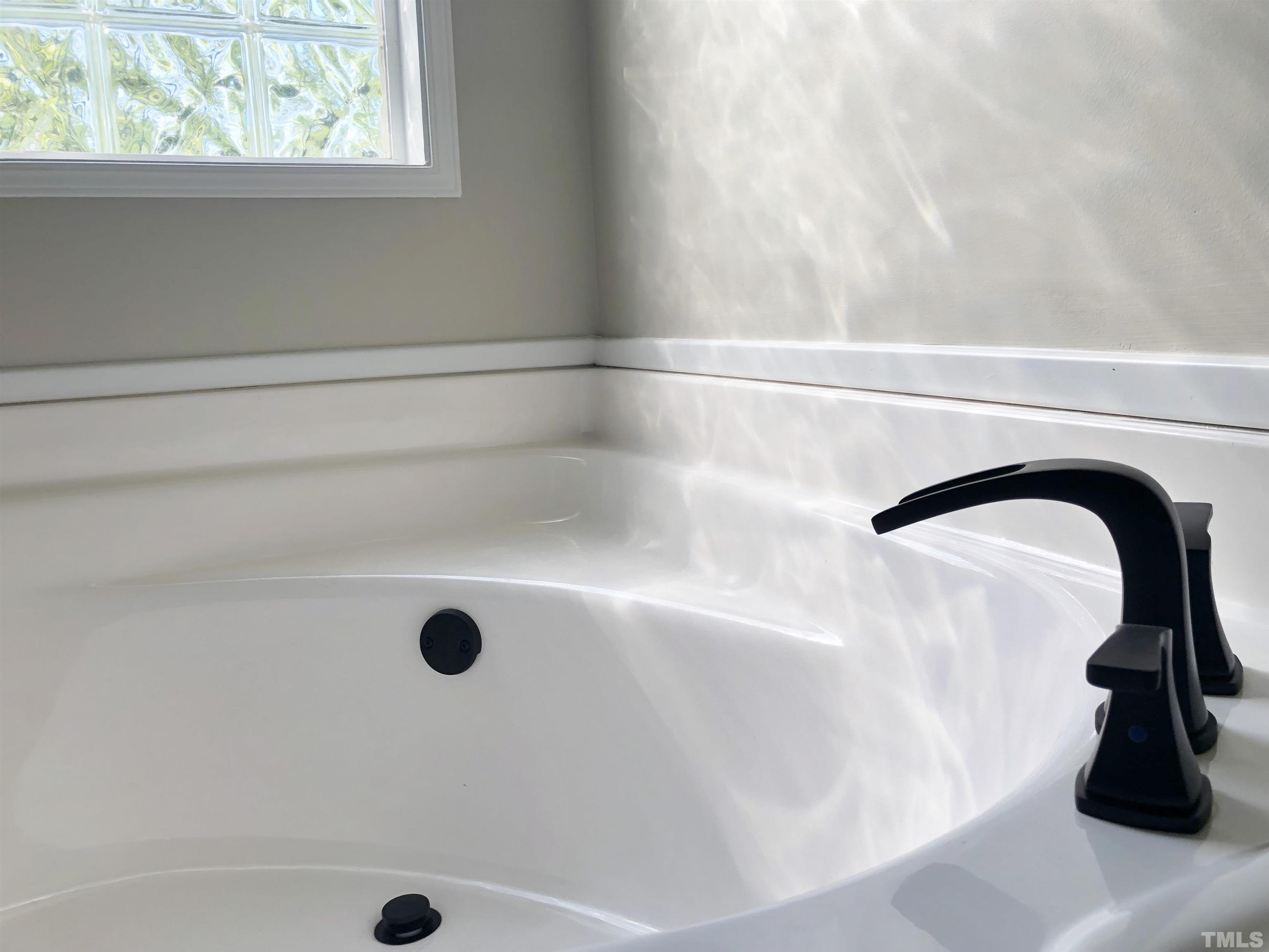 135 Satterfield Farm Road Timberlake, NC 27583 - Photo 19 of 37 a close view of faucet