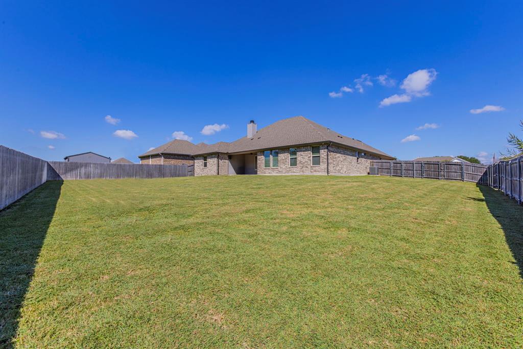 233 Fox Run Lane Robinson, TX 76706 - Photo 25 of 26 a view of a house with a yard