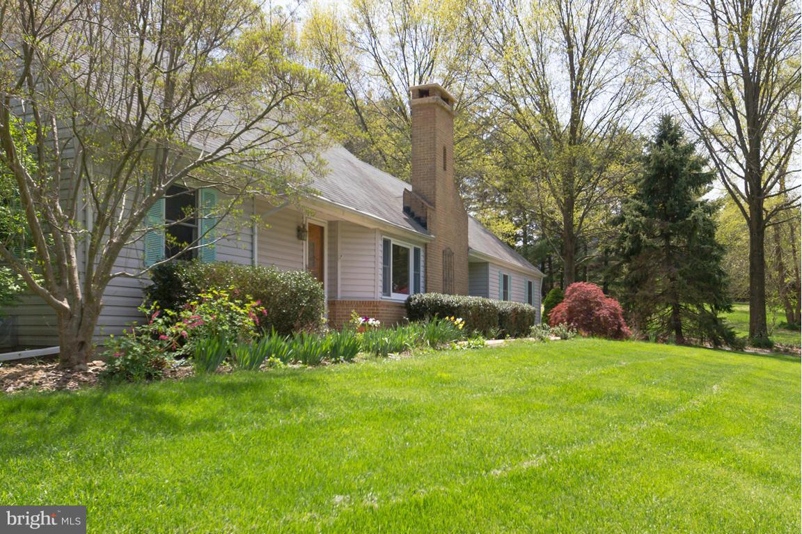 2209 Furnace Road Fallston, MD 21047 - Photo 2 of 30 a view of a house with a big yard and large trees