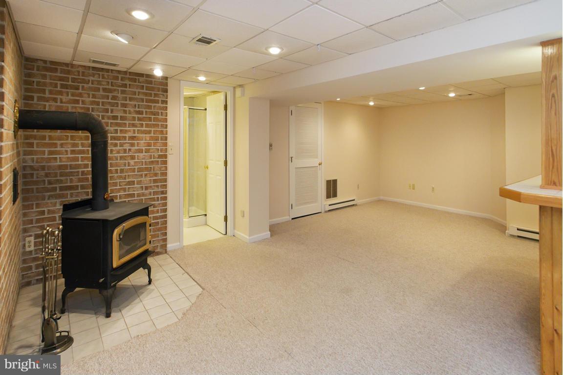 2209 Furnace Road Fallston, MD 21047 - Photo 25 of 30 a view of an empty room with a fireplace