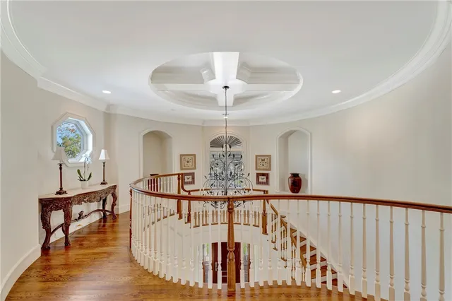 a view of a porch with furniture and a chandelier