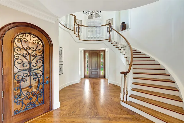 a view of entryway with wooden floor
