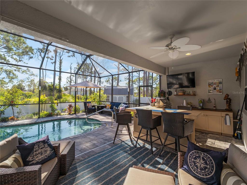 8228 Walbert Street Port Charlotte, FL 33981 - Photo 53 of 66 a view of a dining room with furniture window and outside view