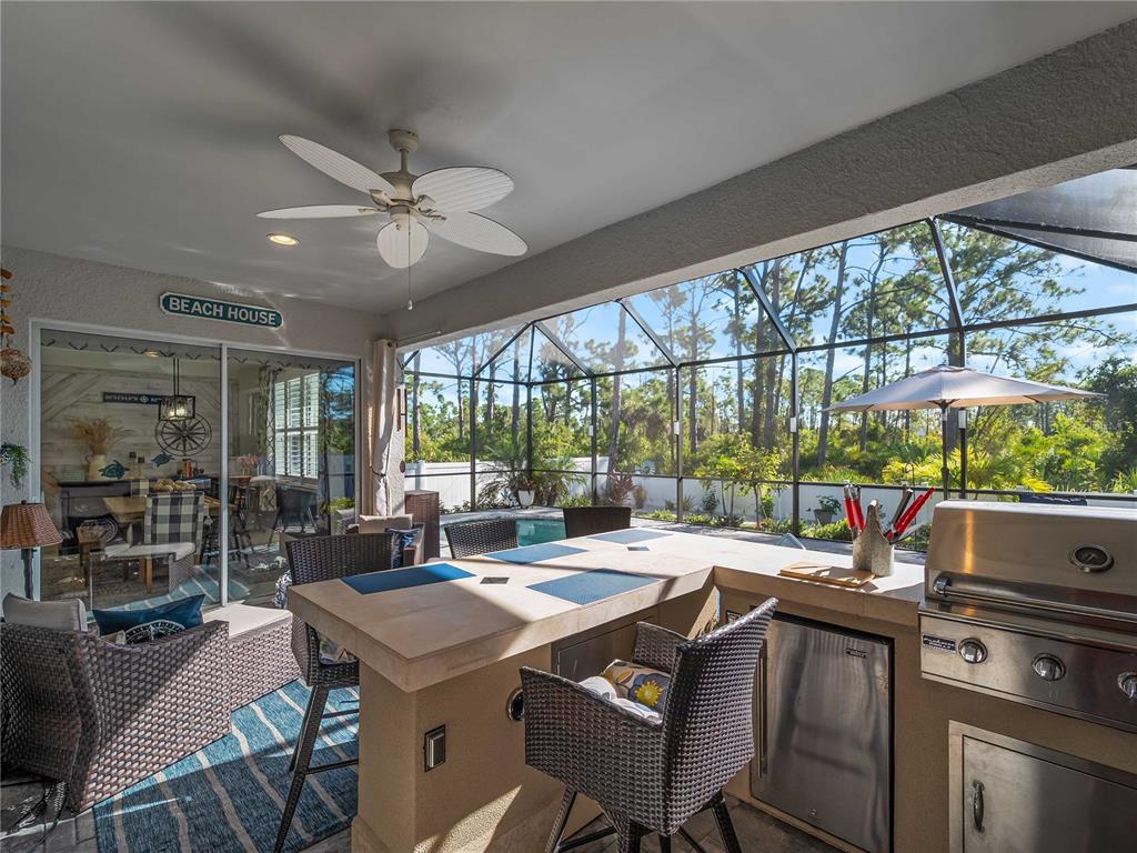 8228 Walbert Street Port Charlotte, FL 33981 - Photo 58 of 66 a view of a dining room with furniture window and outside view