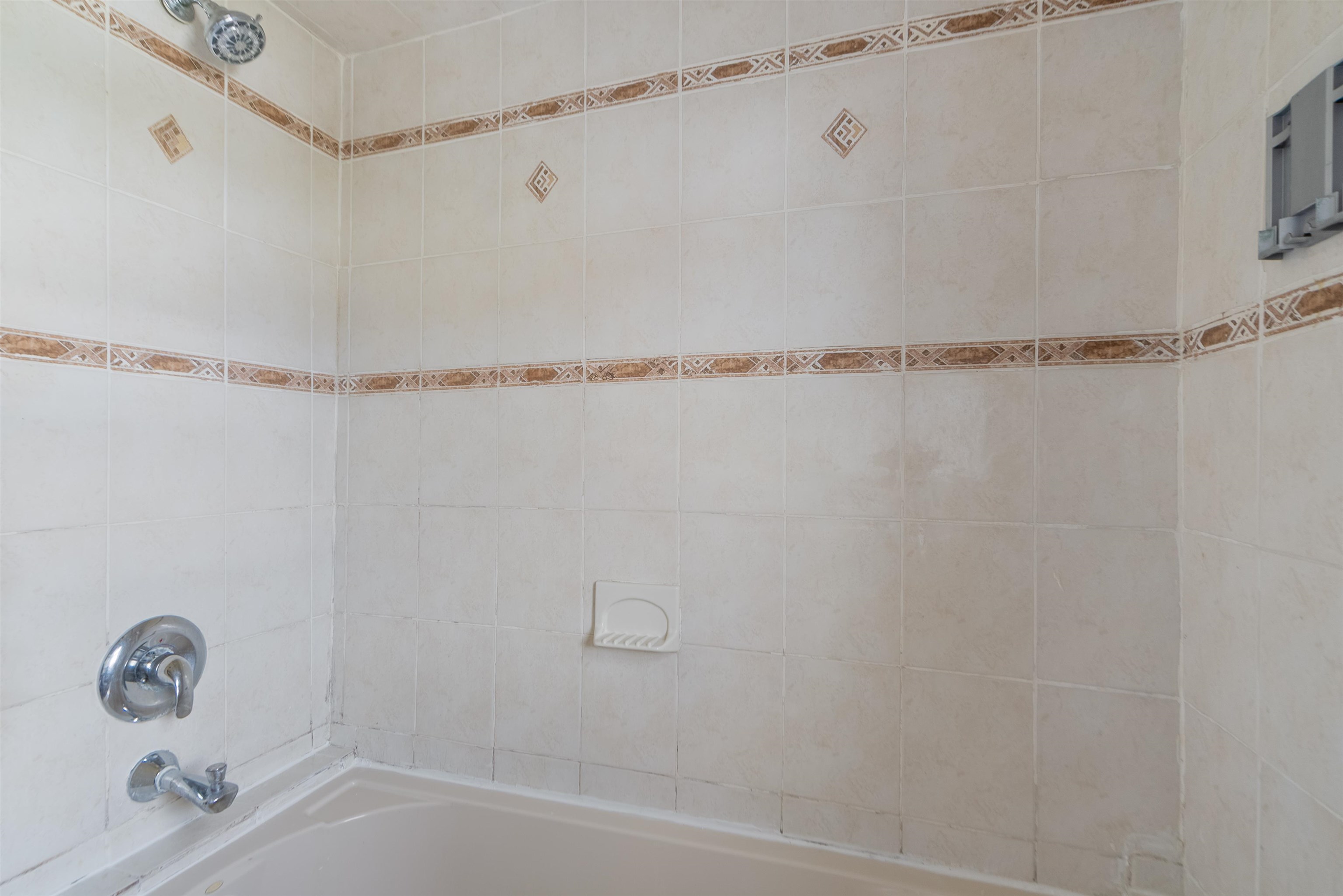 689 2nd Street, Unit 2 Secaucus, NJ 07094 - Photo 17 of 22 a bathroom with a bathtub and shower