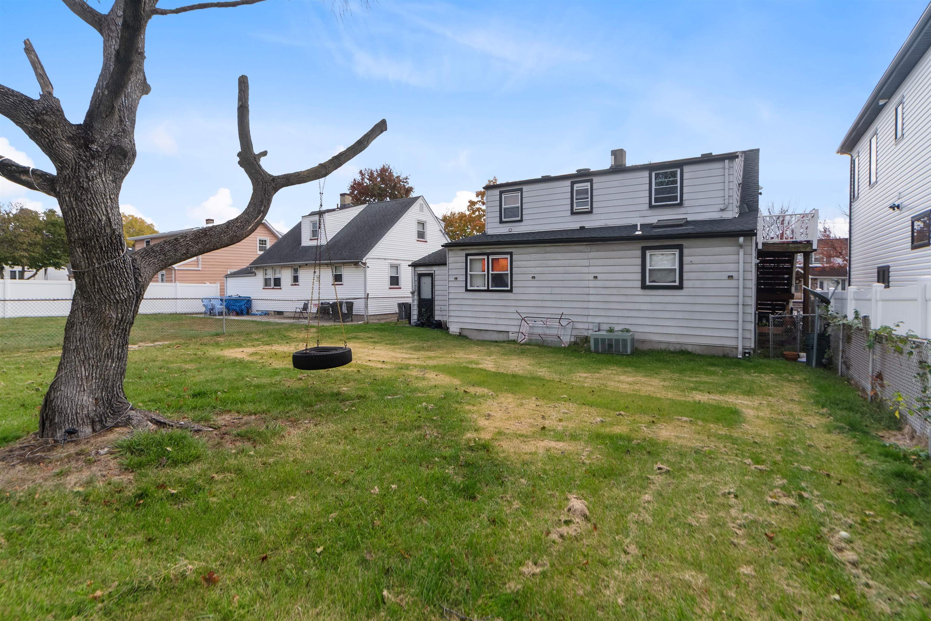 689 2nd Street, Unit 2 Secaucus, NJ 07094 - Photo 18 of 22 a view of a house with a backyard porch and sitting area