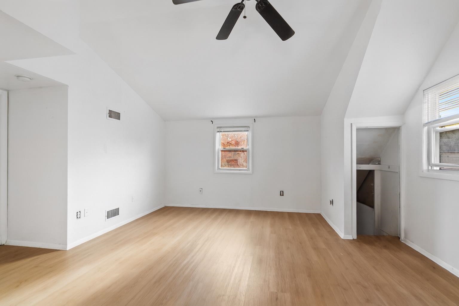 689 2nd Street, Unit 2 Secaucus, NJ 07094 - Photo 2 of 22 an empty room with wooden floor and windows