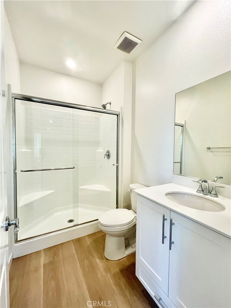 27237 Release Place Newhall, CA 91381 - Photo 11 of 23 a bathroom with a sink toilet and shower