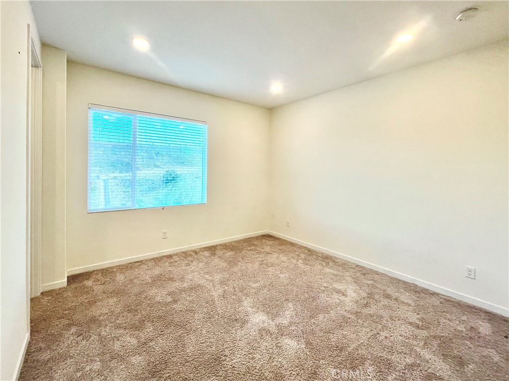 27237 Release Place Newhall, CA 91381 - Photo 19 of 23 an empty room with a empty space