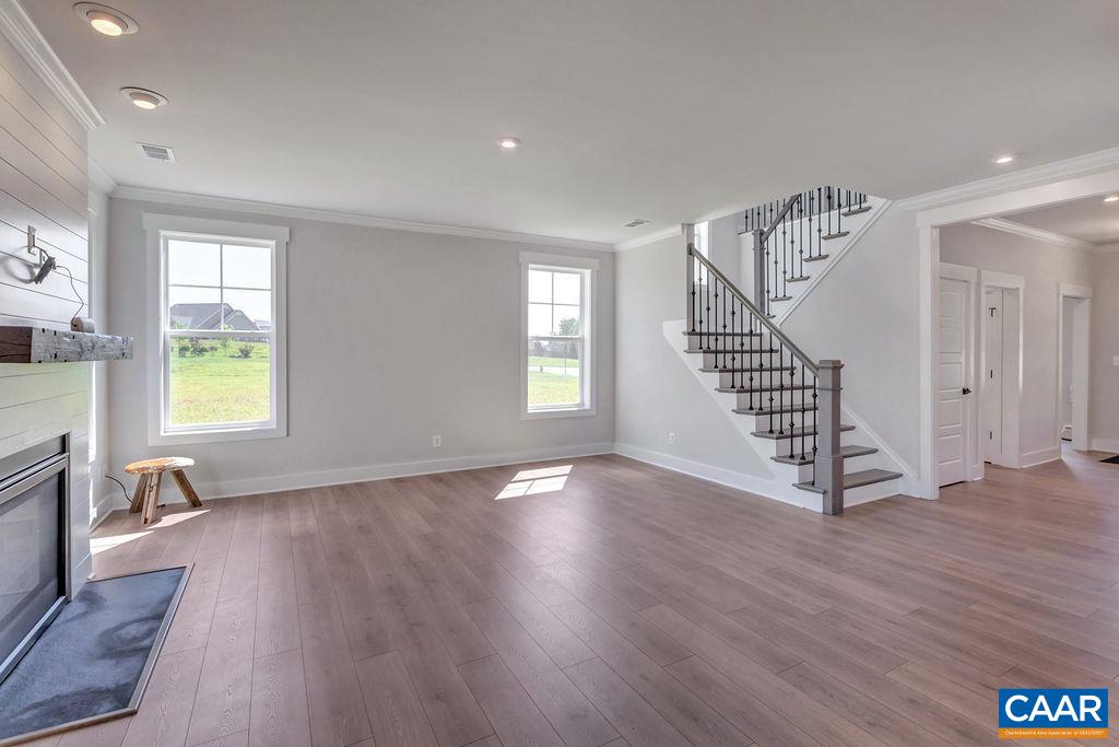 313 Sunbird Lane Waynesboro, VA 22980 - Photo 22 of 45 a view of an empty room with wooden floor and a window