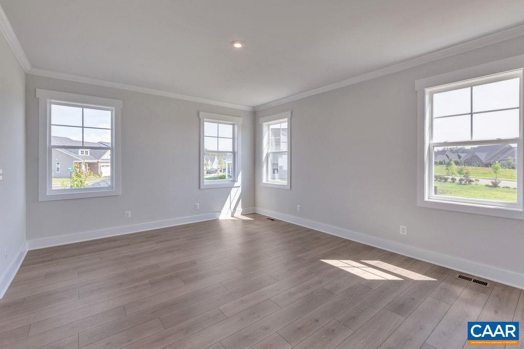 313 Sunbird Lane Waynesboro, VA 22980 - Photo 28 of 45 a view of an empty room with wooden floor and a window
