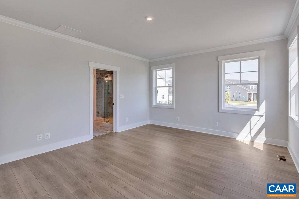 313 Sunbird Lane Waynesboro, VA 22980 - Photo 29 of 45 an empty room with wooden floor and windows