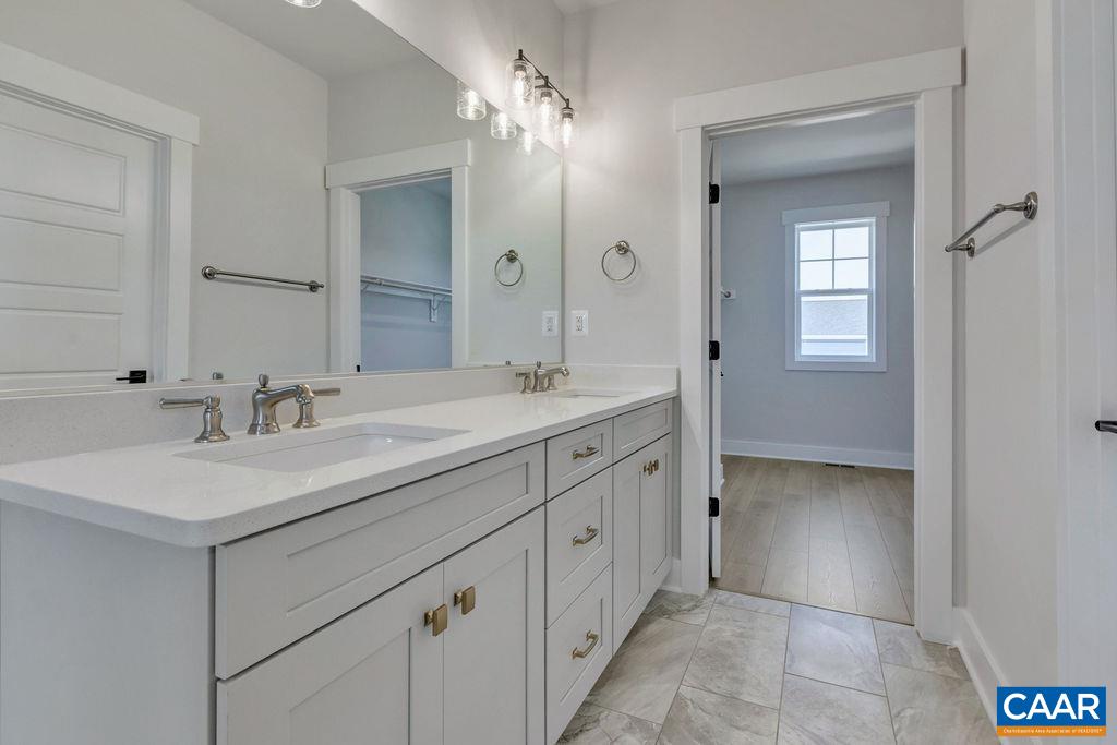 313 Sunbird Lane Waynesboro, VA 22980 - Photo 31 of 45 a bathroom with a sink a vanity and a mirror
