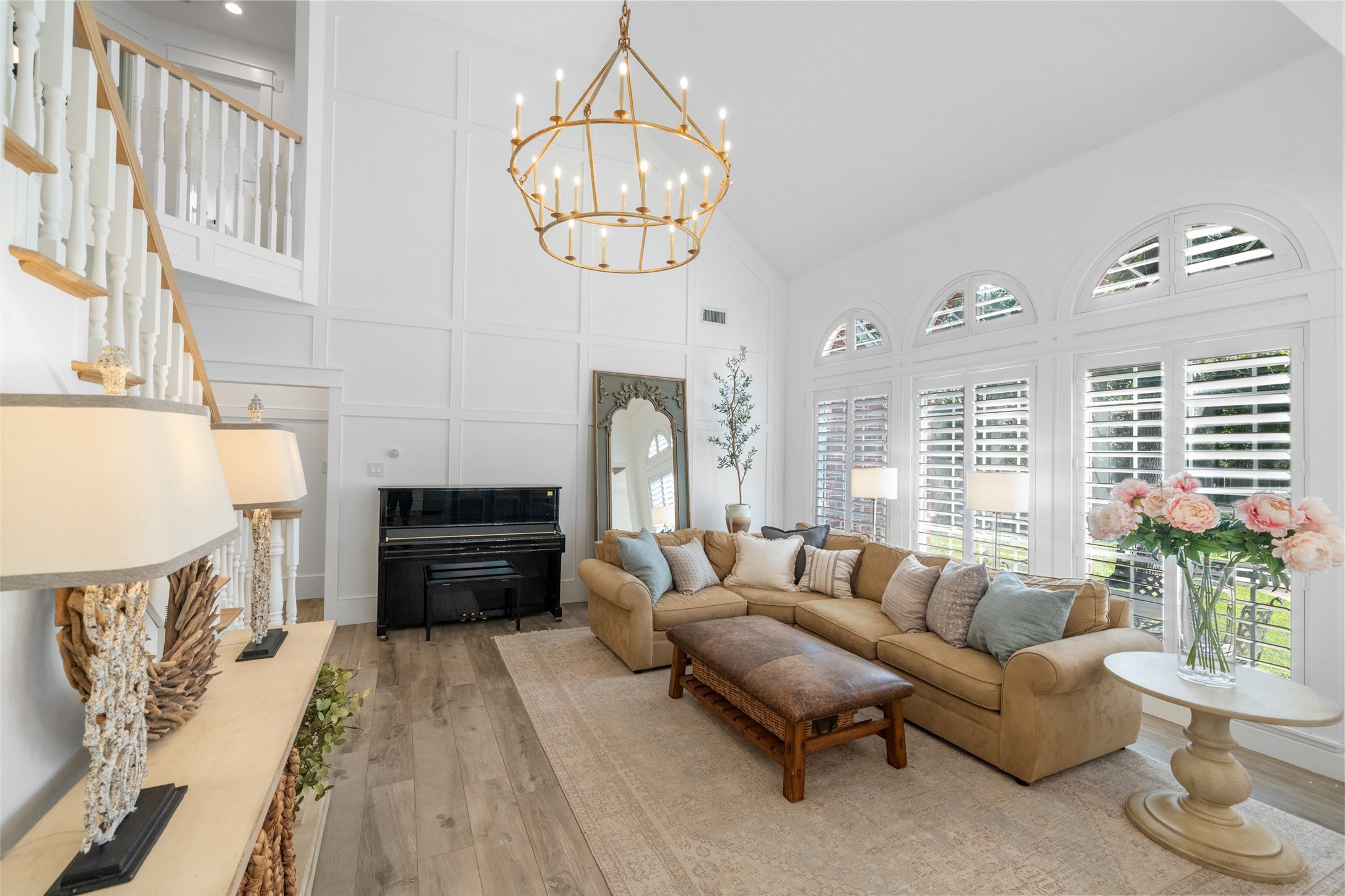18 South Dragonwood Place Spring, TX 77381 - Photo 16 of 50 a living room with furniture chandelier and a fireplace