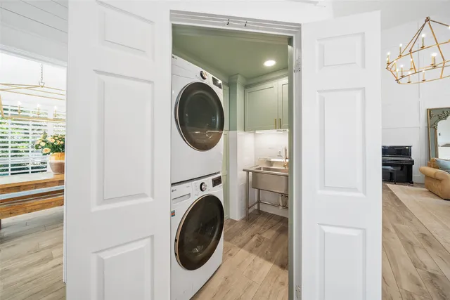 a bedroom with a bed and large flat screen tv