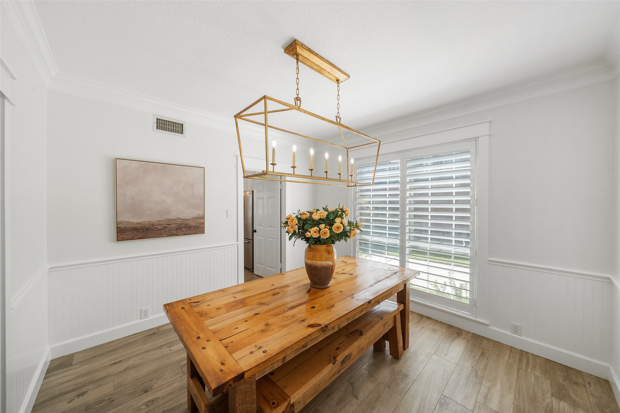 18 South Dragonwood Place Spring, TX 77381 - Photo 33 of 50 a room with wooden floor and a window
