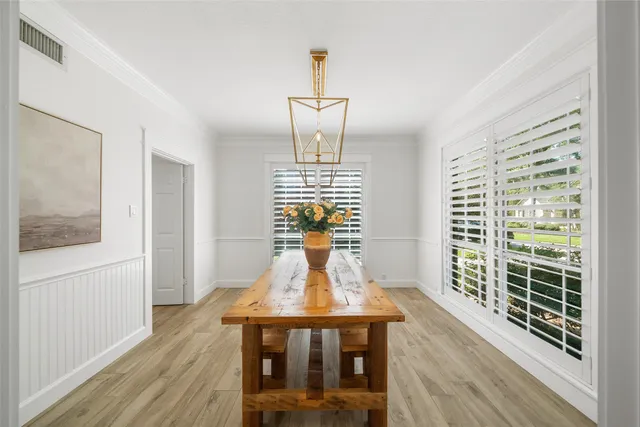 a vase of flowers sitting on a table