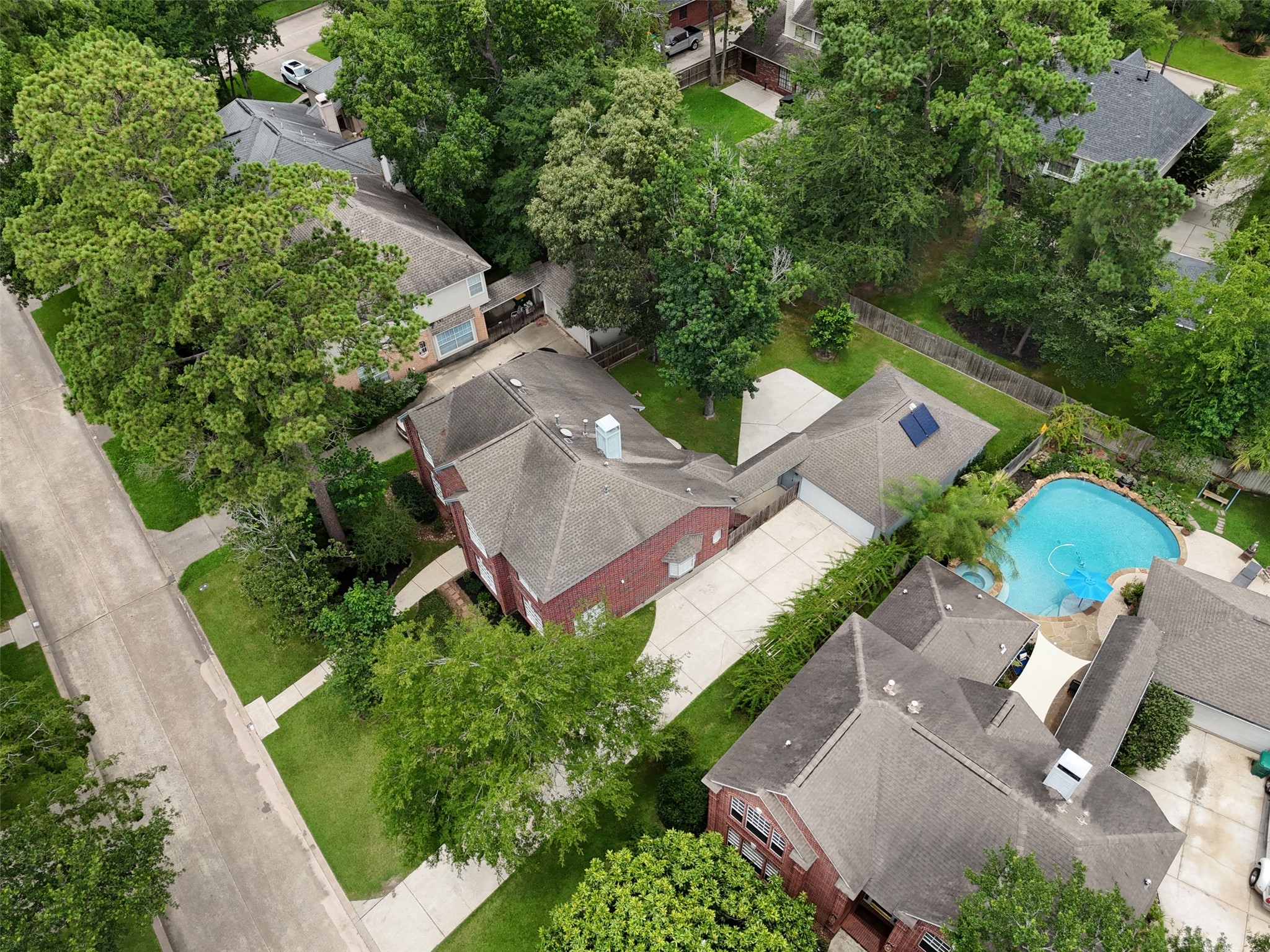 18 South Dragonwood Place Spring, TX 77381 - Photo 50 of 50 an aerial view of a house with garden space and street view