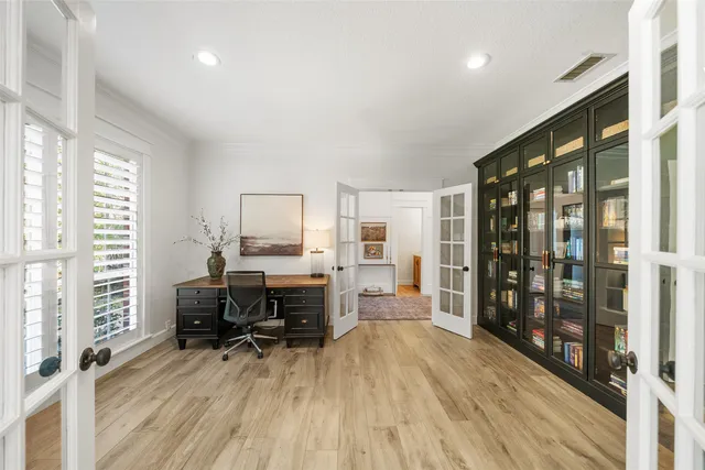 a view of a livingroom with furniture and wooden floor