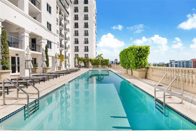 a view of a balcony with chairs