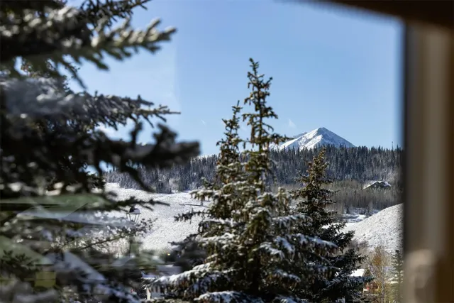 a view of a balcony with furniture