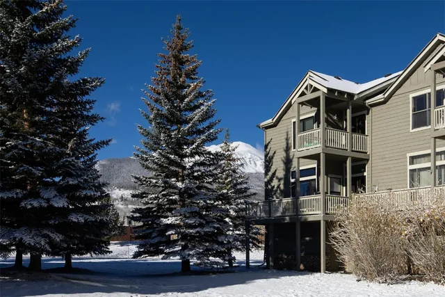 front view of a building with a yard
