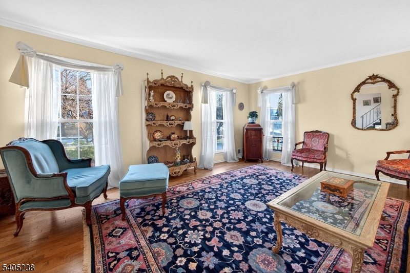 6 Phoenix Drive Mendham, NJ 07945 - Photo 5 of 23 a bedroom with furniture and a window