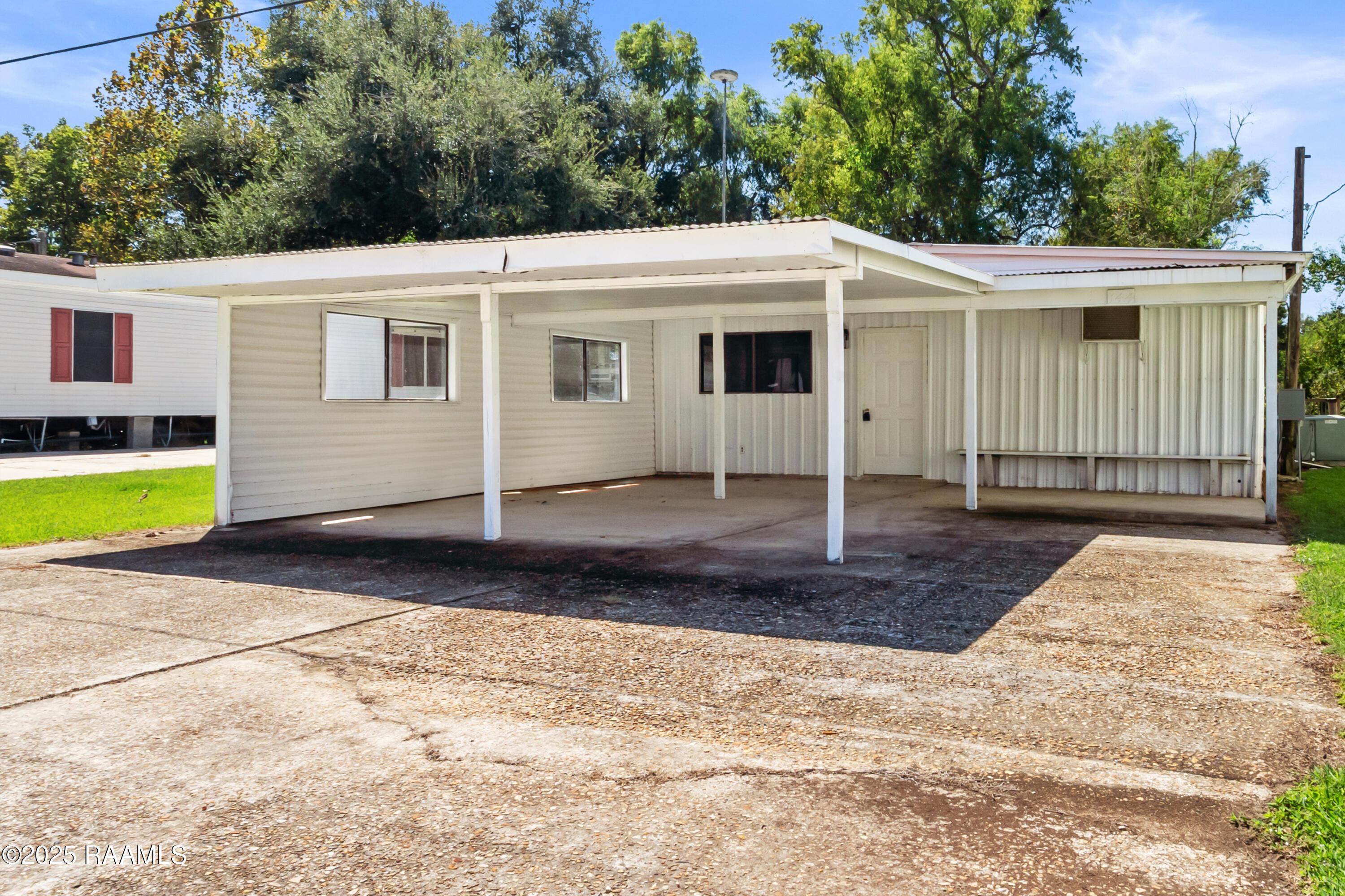 1044 Jean Lafitte Street Breaux Bridge, LA 70517 - Photo 2 of 24 DSC0_0019_DSC000108