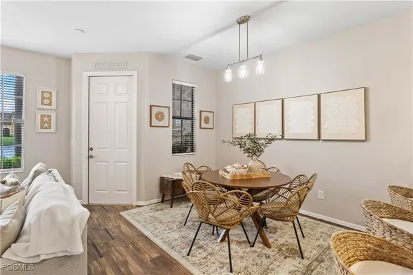 a view of a dining room with furniture