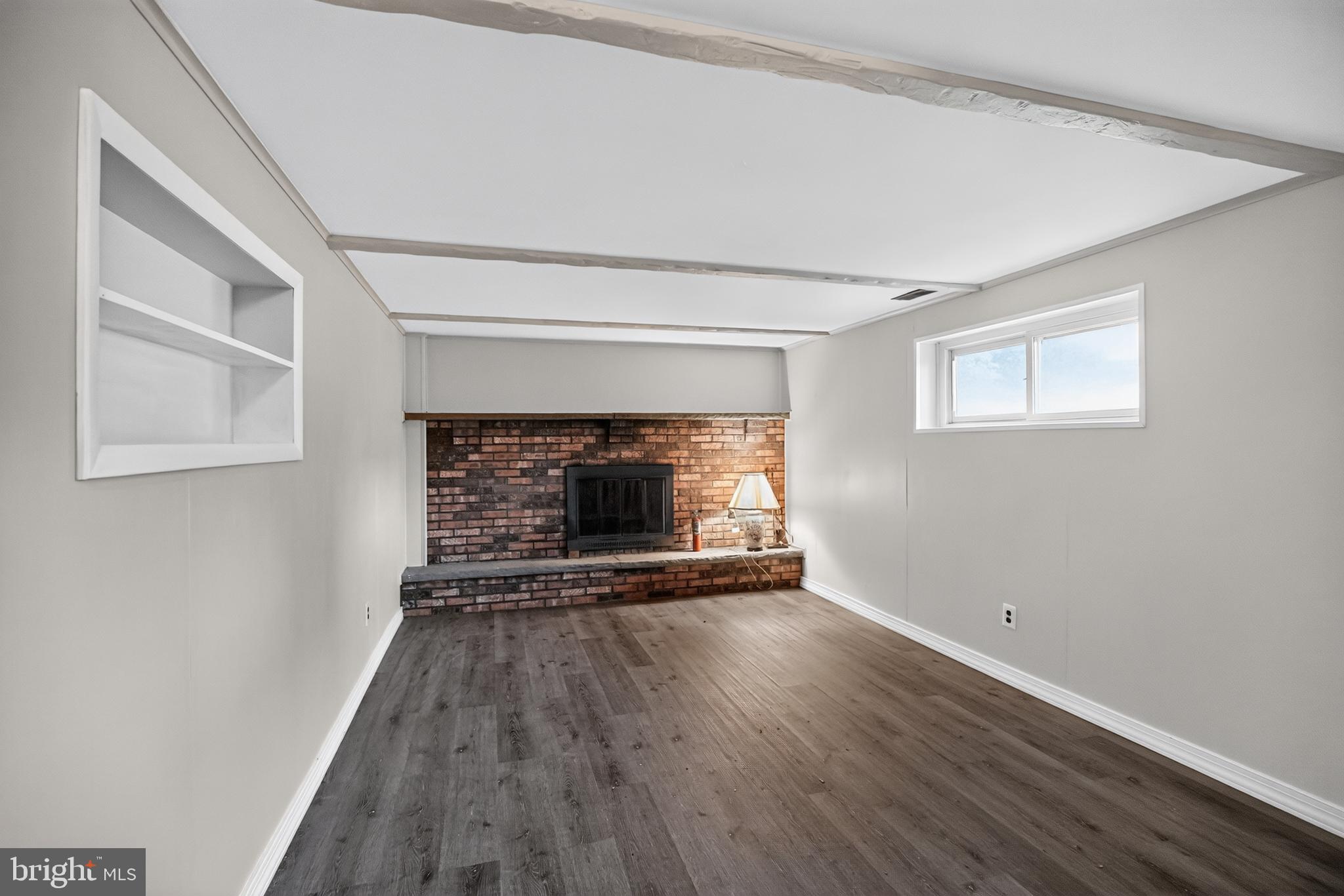 26 Glenwood Road Lumberton, NJ 08048 - Photo 27 of 37 Spacious room with cozy fireplace charm.