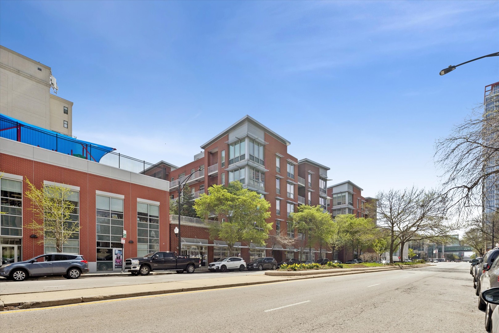 2025 South Indiana Avenue, Unit 209 Chicago, IL 60616 - Photo 1 of 17 a view of a building and a street