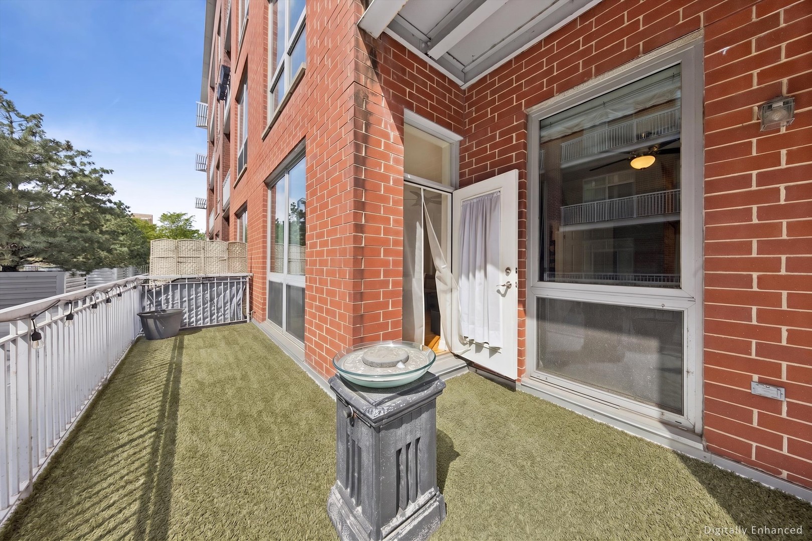 2025 South Indiana Avenue, Unit 209 Chicago, IL 60616 - Photo 16 of 17 a view of a balcony with an outdoor space