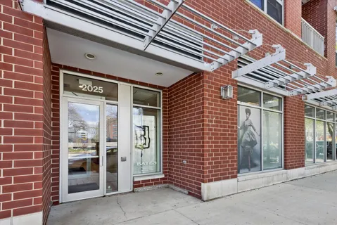 a front view of a building with glass door