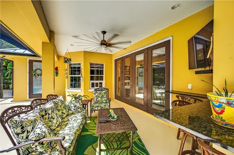 a very nice looking dining room with a large window