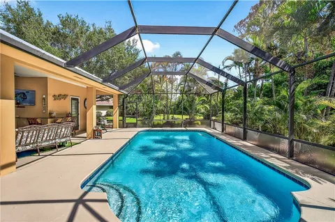 a view of a backyard with a patio
