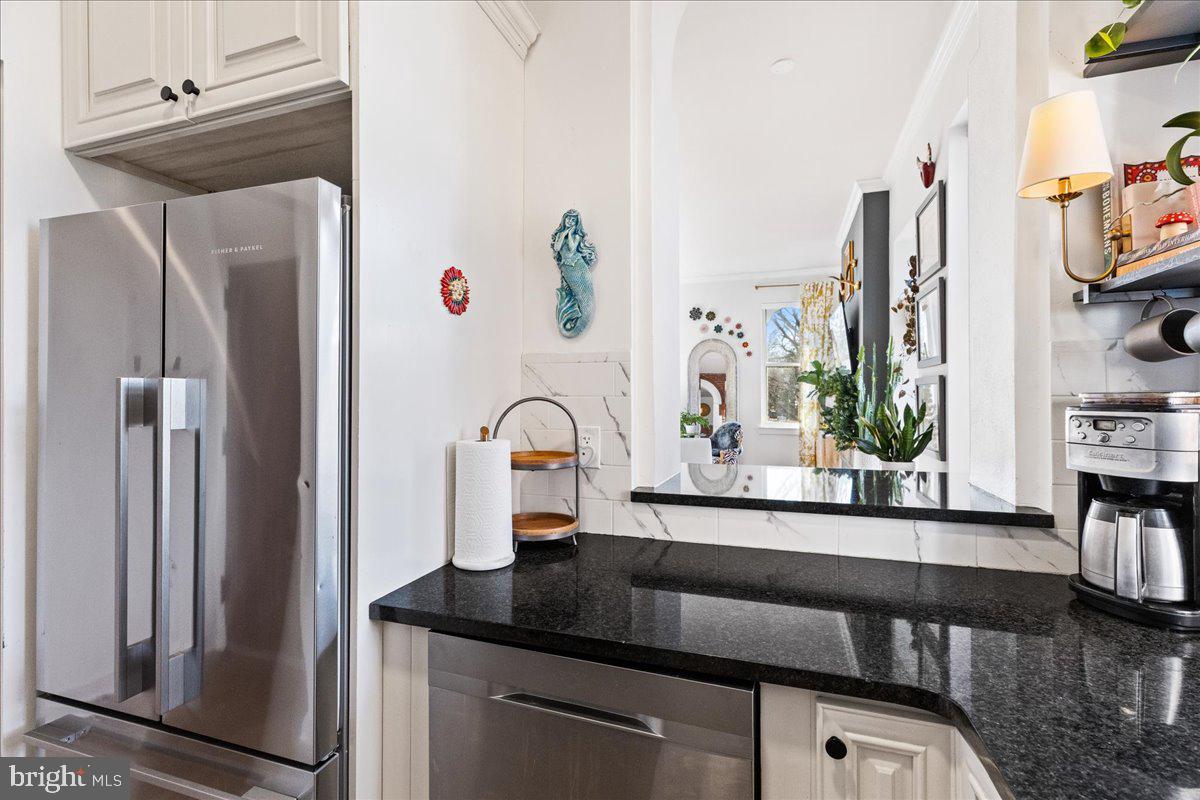8 Academy Court Pennington, NJ 08534 - Photo 11 of 25 a kitchen with appliances a sink and cabinets