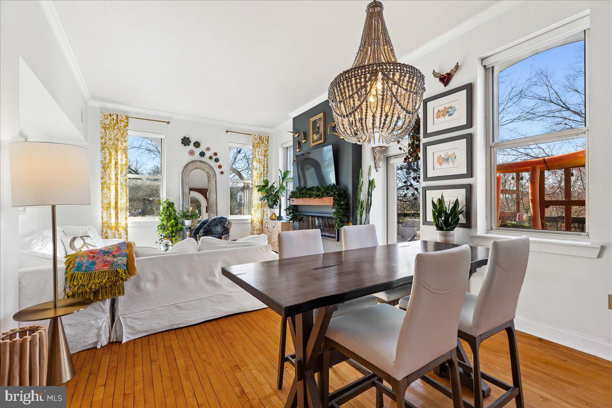8 Academy Court Pennington, NJ 08534 - Photo 3 of 25 a view of a dining room with furniture window and wooden floor