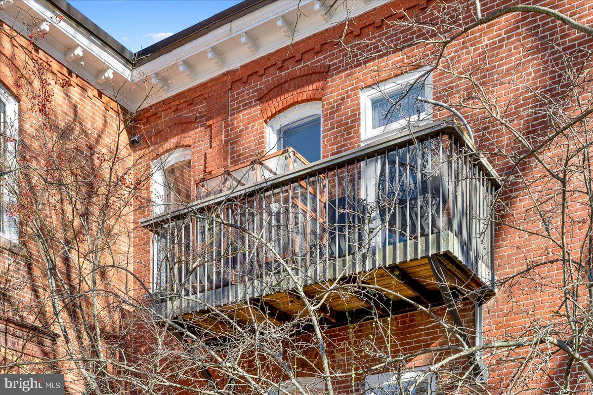 8 Academy Court Pennington, NJ 08534 - Photo 8 of 25 a view of a building with a window