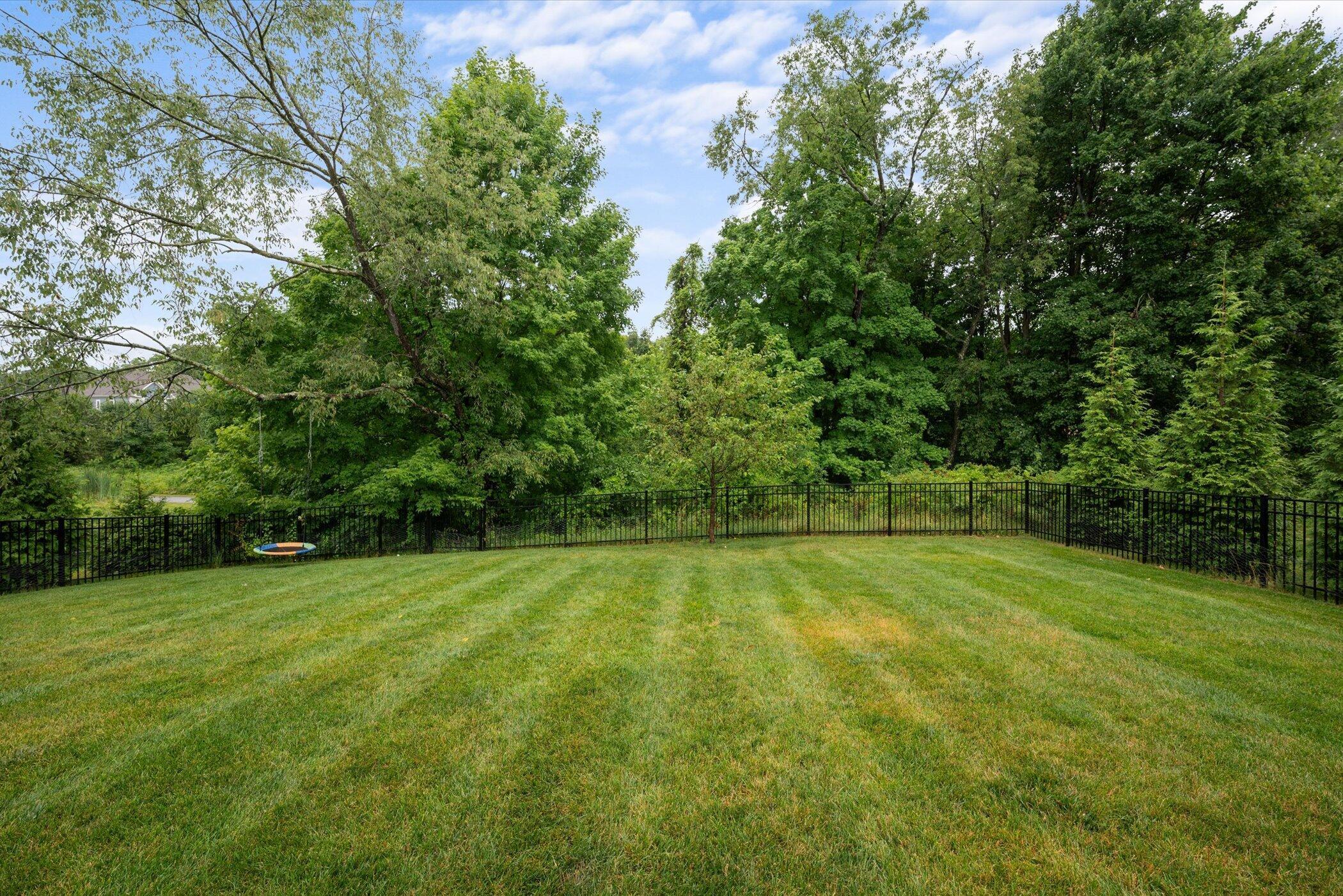706 Bigham Ridge Boulevard Westerville, OH 43081 - Photo 56 of 62 Fenced yard - just WOW! Over 4.5 acres of HOA owned land behind! Green space!